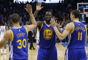 Above: Golden State Warriors' Stephen Curry, Draymond Green, Klay Thompson (AP Photo/Sue Ogrocki)