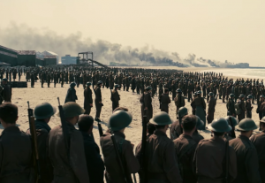 Above: Allied soldiers line the beach in 'Dunkirk'